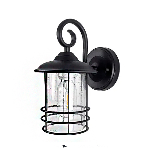 Arandela de parede estilo colonial em metal preto. Possui base arredondada e um braço curvo em forma de "S". A luminária tem topo circular, corpo em vidro transparente com gotas decorativas e uma grade metálica protetora ao redor. No centro, vê-se uma lâmpada de filamento LED.